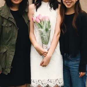 Francesca’s white high-neck dress